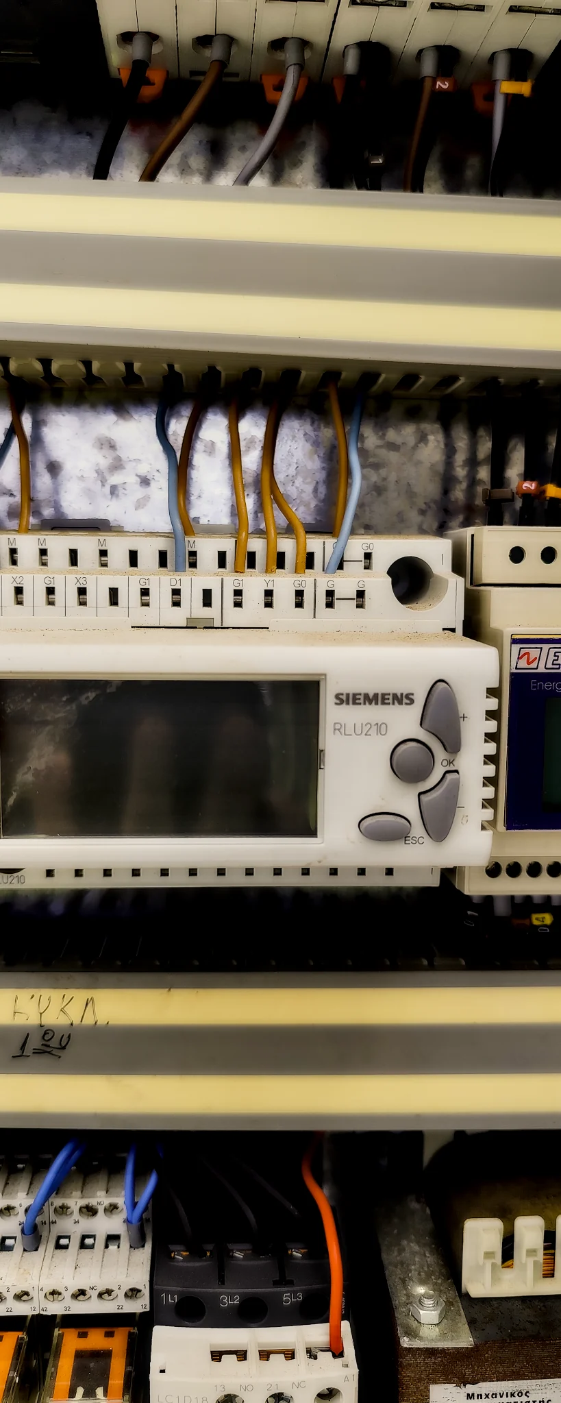 Siemens RLU210 controller for HVAC/BMS inside an automation panel